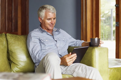Financial planning image of someone enjoying their coffee