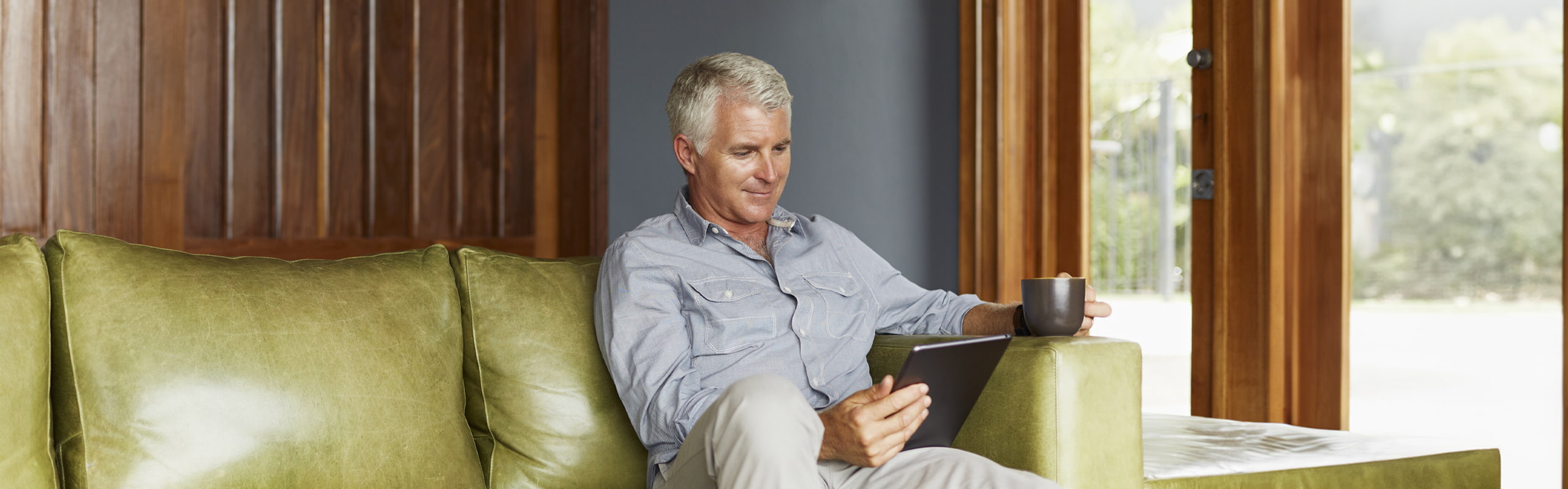 Financial planning image of a person drinking a cup of coffee