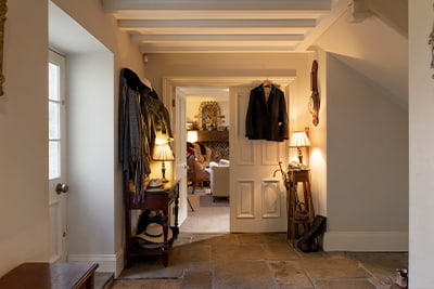 Investing, image of a country home hall
