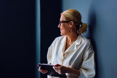 Investing image of a smiling person