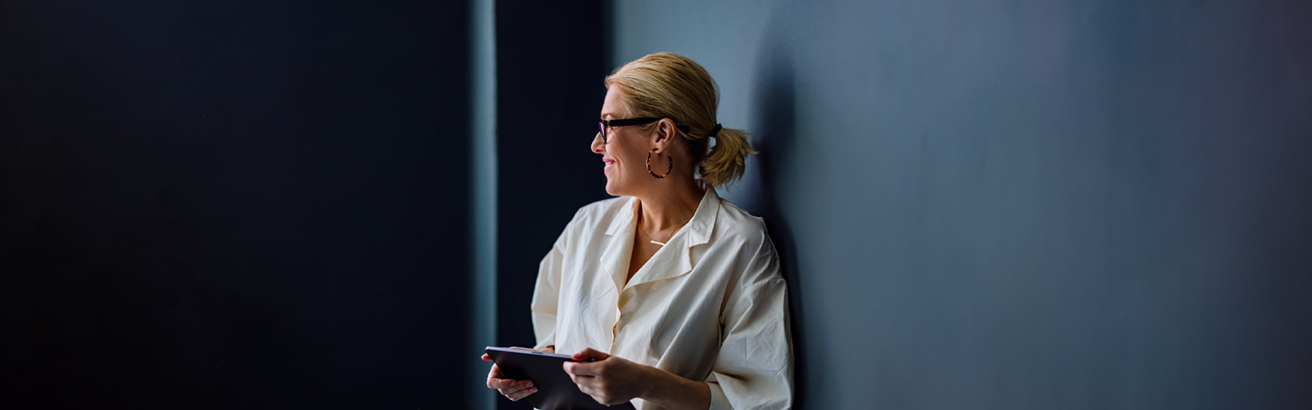 Investing image of a smiling person