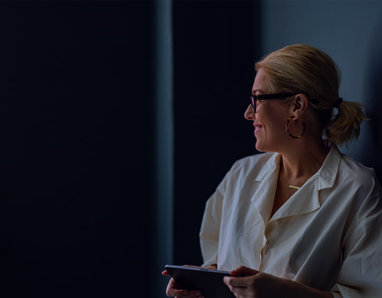 Investing image of a smiling person