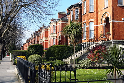 Retirement planning image of red brick houses