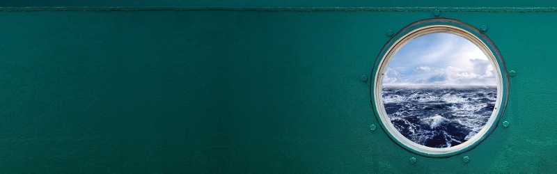 The ocean as seen through a port hole