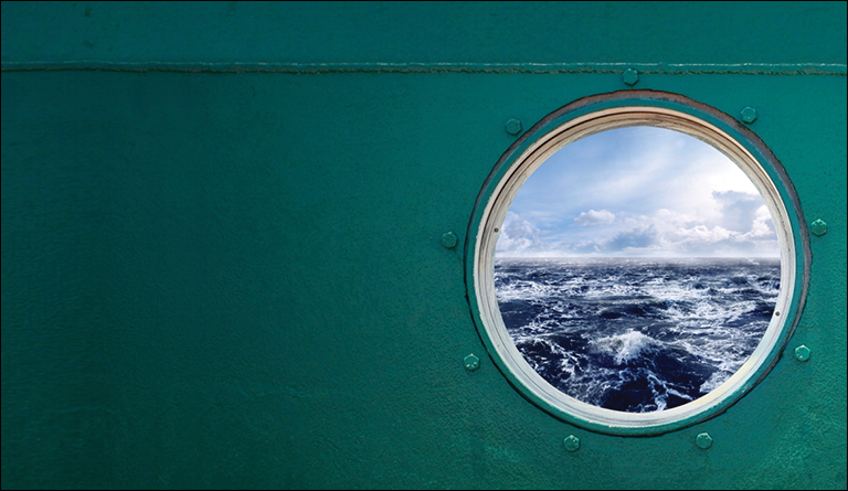 The ocean as seen through a port hole