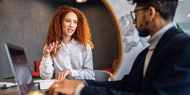 Man and woman in a planning meeting
