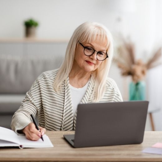 Mature woman on laptop