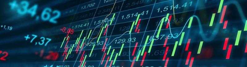 Screen showing stock market increasing and decreasing in chart format